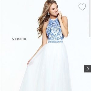 Ivory/Blue Sherri Hill prom dress.